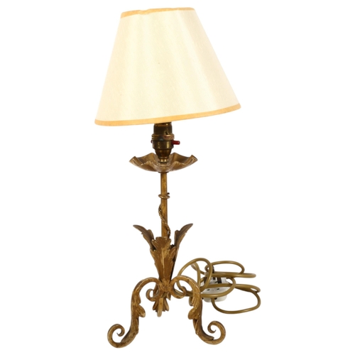 811 - An early 20th century Arts and Crafts wrought-iron table lamp, in working order, with LED bulb and s... 