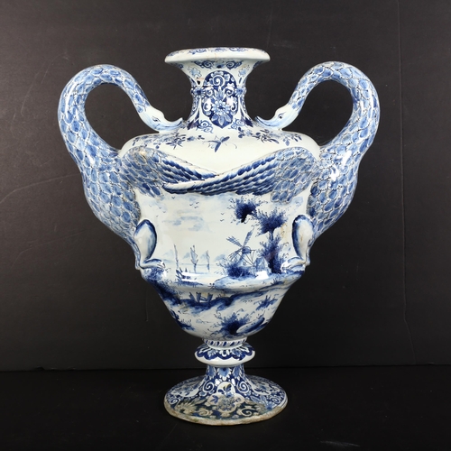 818 - A Dutch Delft blue and white swan neck vase, in restored condition, maker's stamp to base, height ap... 