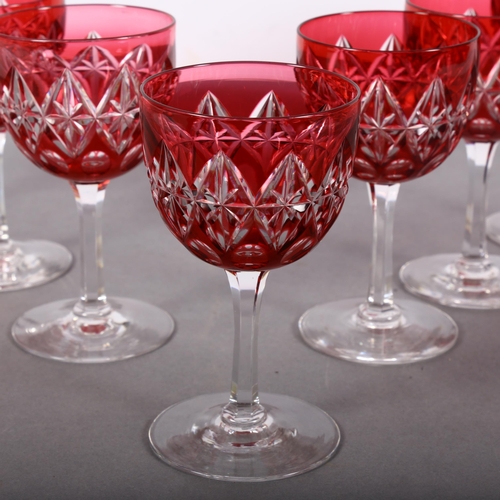 856 - A set of 8 cranberry cut-glass goblets, H12cm