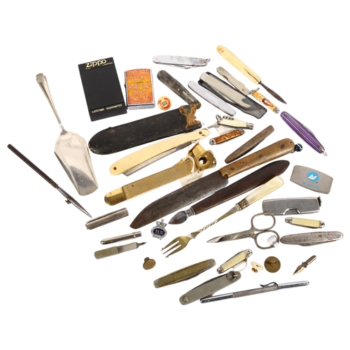 865 - A collection of various penknives, pocket lighter, cigar cutter, etc