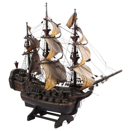 877 - A scratch-built wooden galleon ship, with 3 masts, and associated wooden stand, L68cm, H68cm