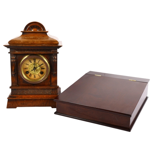 882 - An ornate Antique oak-cased mantel clock, 8-day movement, with pendulum and key, H34cm, and a modern... 