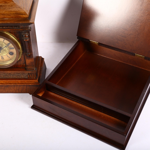 882 - An ornate Antique oak-cased mantel clock, 8-day movement, with pendulum and key, H34cm, and a modern... 