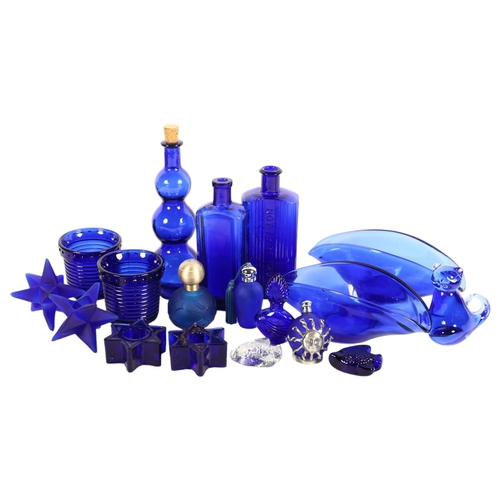 884 - A selection of blue glassware, including various apothecary bottles, various Soerby style oval glass... 