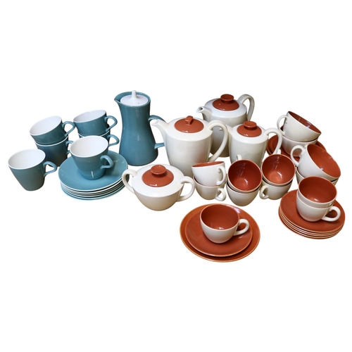 893 - A Poole Pottery Twintone Red Indian and Magnolia part tea and coffee set, including various cups sau... 