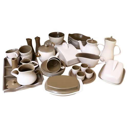 894 - A Poole Pottery Twintone Sepia and Mushroom part tea and dinner service, including various cups, sau... 