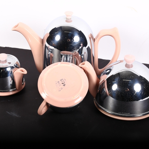 895 - A group of pink ceramic and chrome Art Deco style Heatmaster teapot, coffee pot, milk jug, etc, make... 