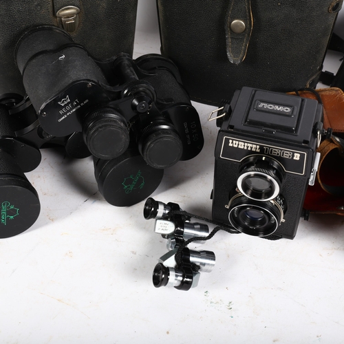 896 - A group of Vintage cameras and binoculars, including a Lubitel 166B, a Konica Auto S 2, a pair of Gr... 