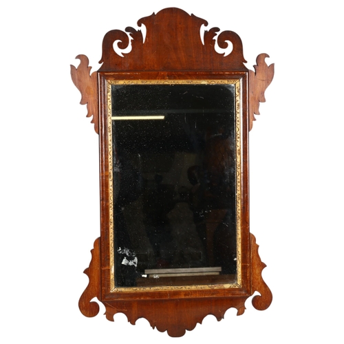 928 - A Georgian mahogany-framed wall mirror, with carved frame, 69cm x 41cm