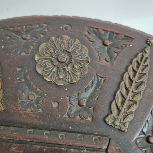 174 - A Spanish carved wood circular brazier, with copper bowl, and applied brass decoration, diameter 43c... 