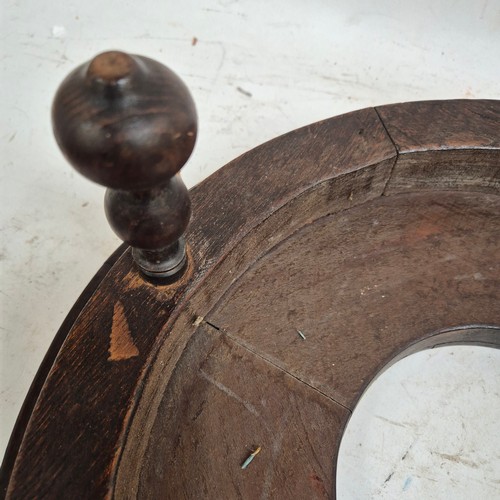 174 - A Spanish carved wood circular brazier, with copper bowl, and applied brass decoration, diameter 43c... 