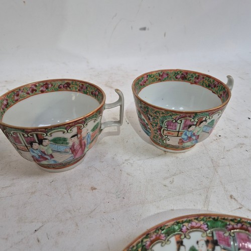 186 - A set of 5 Chinese famille rose Canton cups and saucers