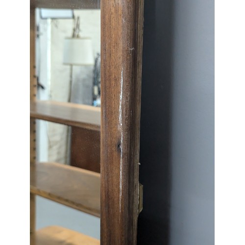 2303 - A large teak framed rectangular mirror. As photographed, width 107cm, height 232cm.