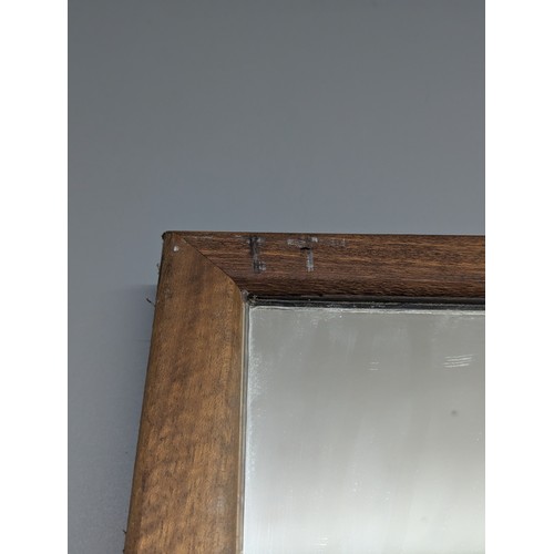 2303 - A large teak framed rectangular mirror. As photographed, width 107cm, height 232cm.