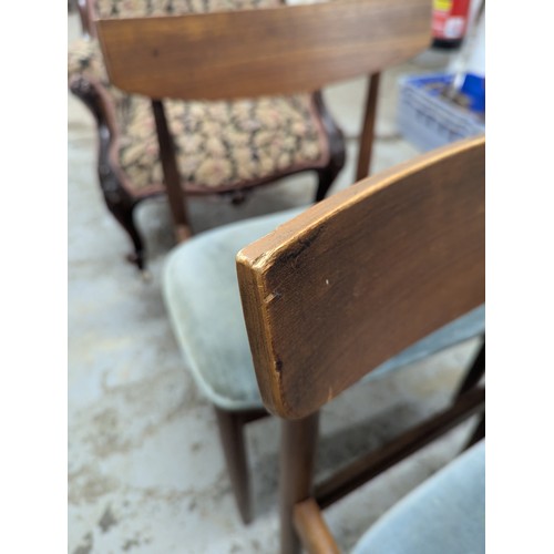 2675 - G-PLAN - A set of four mid-century teak dining chairs in original upholstery.