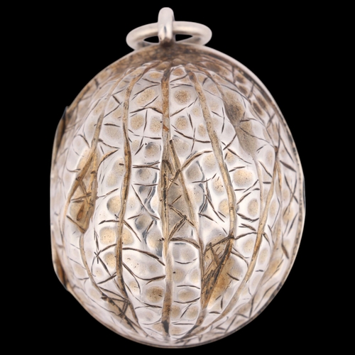 SAMPSON MORDAN & CO - a Victorian novelty silver 'Walnut' vinaigrette, realistically modelled, the interior with pierced and engraved gilded grille, 4cm, 19.8g