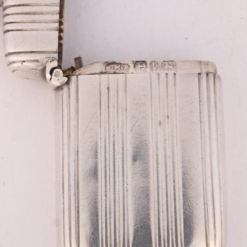 114 - A Victorian silver Vesta case, John Millward Banks, Birmingham 1893, rounded rectangular form with r... 