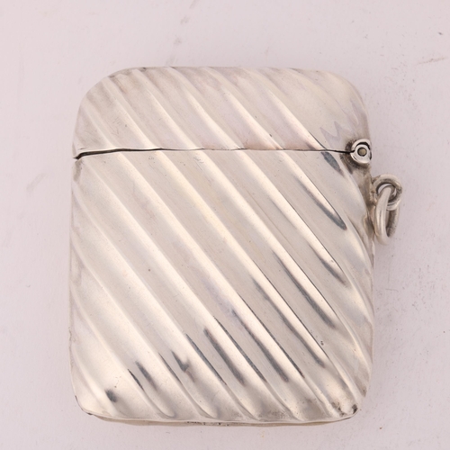 118 - A Victorian silver Vesta case, L Spiers, Birmingham 1890, rectangular form with fluted decoration an... 