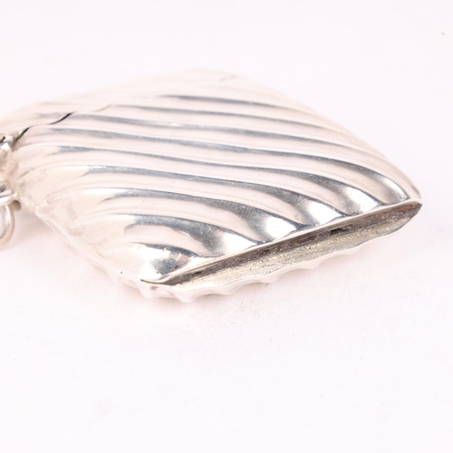 118 - A Victorian silver Vesta case, L Spiers, Birmingham 1890, rectangular form with fluted decoration an... 