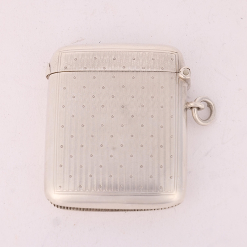 120 - An Edwardian silver Vesta case, William Neale & Sons, Chester 1907, rounded rectangular form with en... 