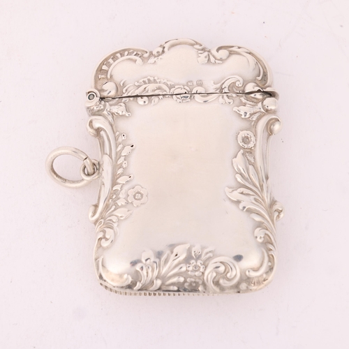 121 - A late Victorian silver Vesta case, Levi & Salaman, Birmingham 1896, shaped rectangular form with re... 