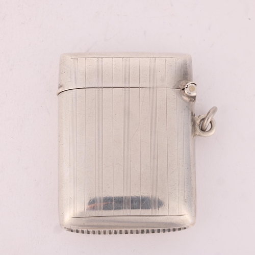 124 - A George V silver Vesta case, WJ Myatt & Co, Birmingham 1924, rounded rectangular form with engine t... 