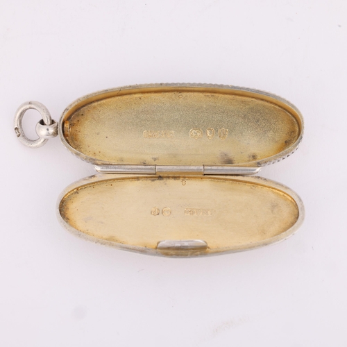 13 - SAMPSON MORDAN & CO - a Victorian silver Vesta/toothpick case, London 1890, oval form with allover c... 