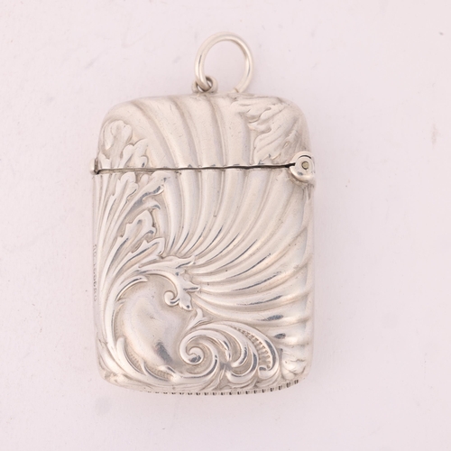 136 - A late Victorian silver Vesta case, Lines, Bunn & Mason, Birmingham 1898, rectangular form with reli... 