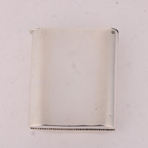 141 - A late Victorian silver Vesta case, Nathan & Hayes, Birmingham 1893, plain curved rectangular form, ... 