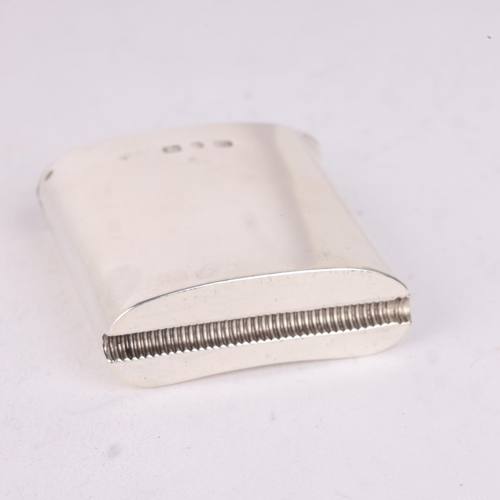 141 - A late Victorian silver Vesta case, Nathan & Hayes, Birmingham 1893, plain curved rectangular form, ... 