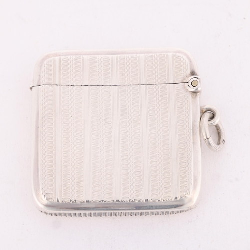 149 - An Art Deco George V silver Vesta case, Henry Matthews, Birmingham 1919, curved rectangular form wit... 