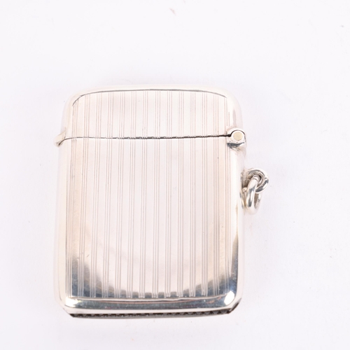 154 - An Art Deco George V silver Vesta case, Frederick Field Ltd, Birmingham 1920, curved rectangular for... 