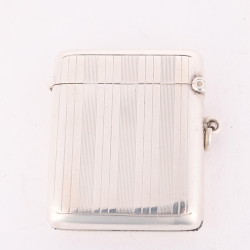 157 - An Art Deco George V silver Vesta case, A&J Zimmerman, Birmingham 1916, rounded rectangular form wit... 