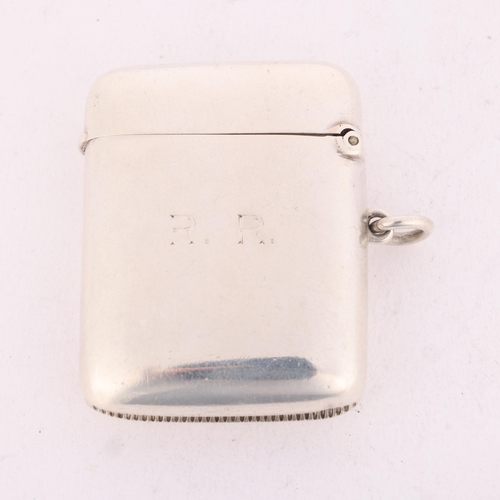 164 - A late Victorian silver 'Armorial' Vesta case, Stokes & Ireland Ltd, Chester 1897, rounded rectangul... 