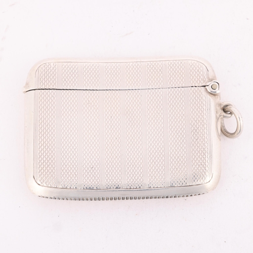 165 - An Art Deco George V silver Vesta case, Henry Matthews, Birmingham 1920, curved rectangular form wit... 