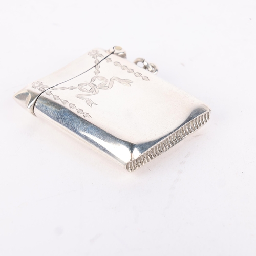 171 - An Edwardian silver Vesta case, Robert Pringle & Sons, Birmingham 1908, curved rectangular form with... 