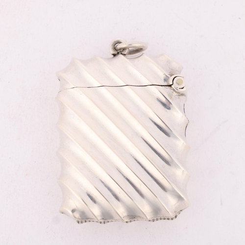 179 - A late Victorian silver Vesta case, A&J Zimmerman Ltd, 1900, rectangular form with allover fluted sp... 