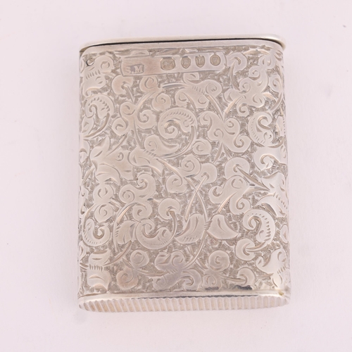 18 - SAMPSON MORDAN & CO - a Victorian silver Vesta case, London 1886, rounded rectangular form with allo... 