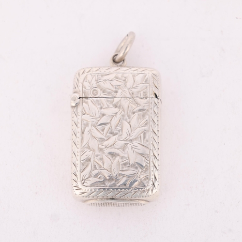 181 - A Victorian miniature silver Vesta case, Joseph Fray, Chester 1885, rectangular form with allover en... 