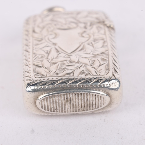 181 - A Victorian miniature silver Vesta case, Joseph Fray, Chester 1885, rectangular form with allover en... 