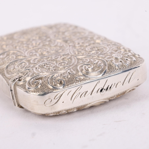 185 - A Victorian silver Vesta case, Adie & Lovekin, Birmingham 1886, rectangular form with allover relief... 