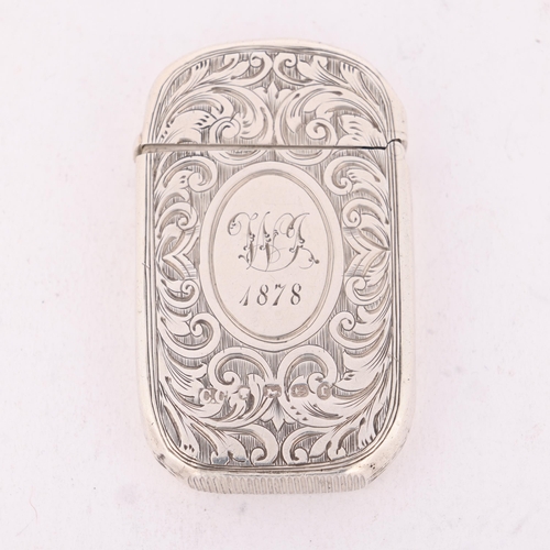 195 - A Victorian silver Vesta case, Colen Hewer Cheshire, Birmingham 1877, oval form with allover foliate... 