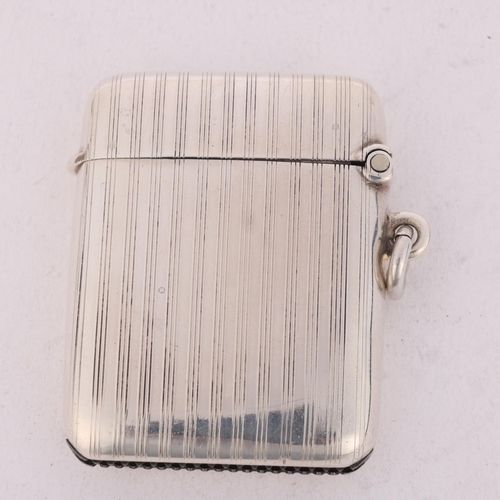 198 - An Art Deco George V silver Vesta case, Henry Williamson Ltd, N1919, rectangular form with allover e... 