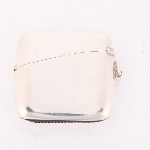 199 - A George V silver Vesta case, E H Lawley & Sons Ltd, Birmingham 1912, curved square form with diagon... 