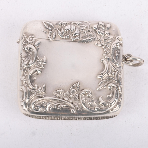 214 - A late Victorian silver Vesta case, Harry Hayes, Birmingham 1898, curved rectangular form with allov... 