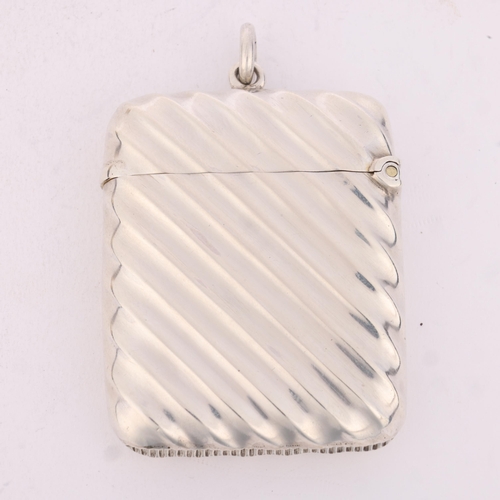 218 - A late Victorian silver Vesta case, Horton & Allday, Birmingham 1895, rectangular form with allover ... 