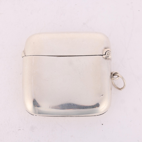 219 - A George V silver Vesta case, Colen Hewer Cheshire, Chester 1918, curved plain rectangular form with... 