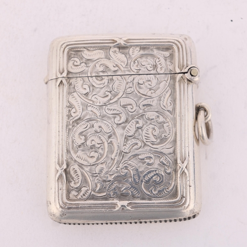 222 - An Edwardian silver Vesta case, Henry Matthews, Birmingham 1906, rectangular form with allover engra... 