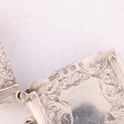 222 - An Edwardian silver Vesta case, Henry Matthews, Birmingham 1906, rectangular form with allover engra... 