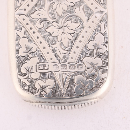 225 - A Victorian silver Vesta case, Howard James, Birmingham 1886, oval form with allover foliate engrave... 